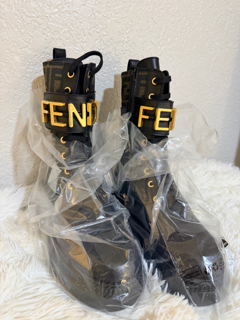 Fendi Black and Gold Logo Strap Combat Boots